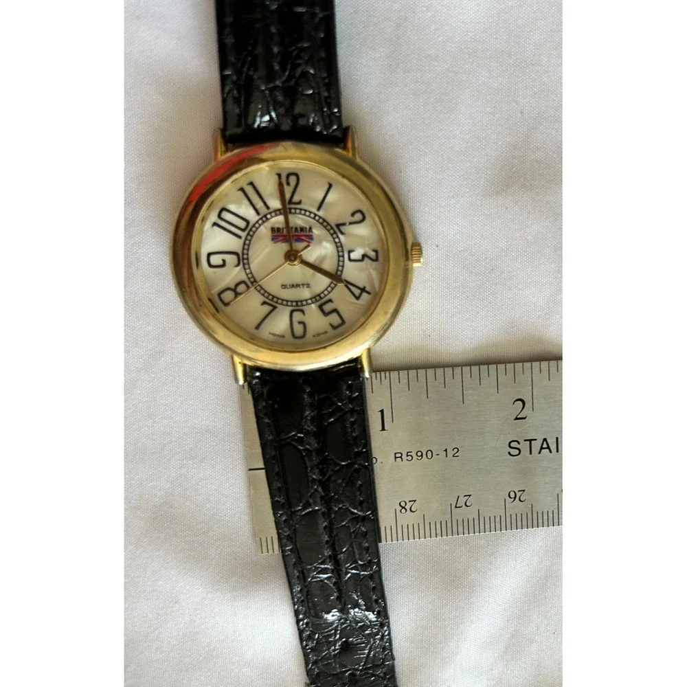 Vintage 1990s Brittania Watch by Quintel Inc Genuine Leather Band Retro